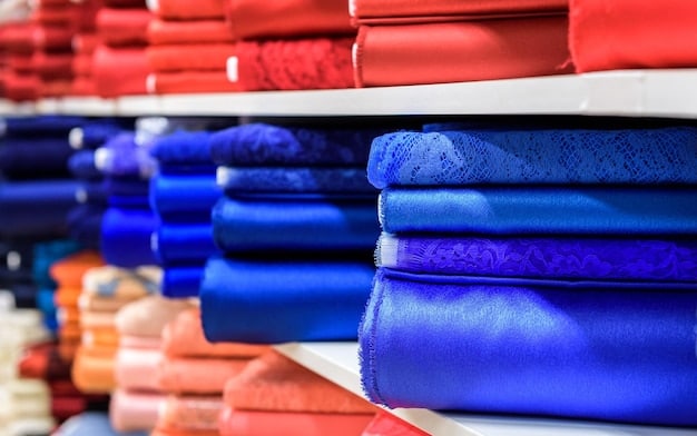 A close-up shot of various fabrics in different shades of blue, arranged to showcase texture and color variation.