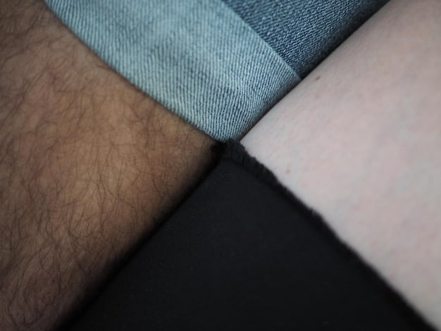 A close-up shot of different fabric swatches for oversized blazers: tweed, wool, linen, and leather. Each swatch is labeled with its material name.