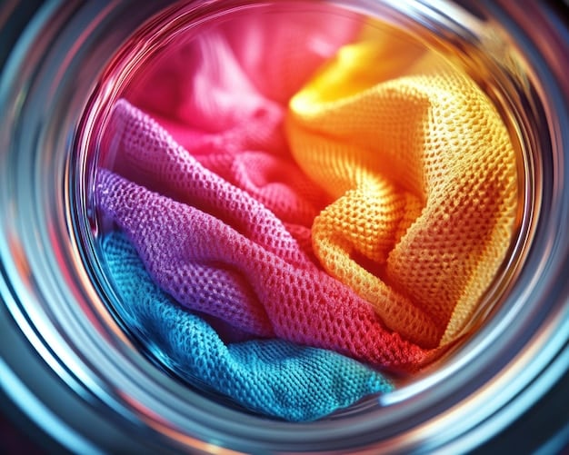 A washing machine with a close-up of a garment being washed inside, showcasing different colored fabrics blending together.